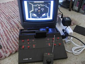 The system powerd on and running a pinball game (early Midnight Magic?) off a personally made EPROM cart