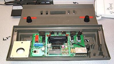 Inside the CX-2500, showing unfinished controls and its reusing a whole 2600 motherboard