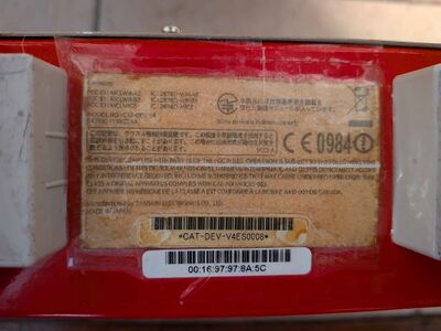 The serial label for the red CAT-DEV unit. It is: `CAT-DEV-V4ES0008`, and does not have a "S/N" in front of it.
