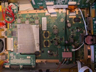 a full CAT-DEV v4 board which contains an extra CAT-JTAG board ontop.
