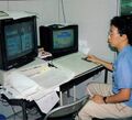Tezuka editing the character data for Super Mario Bros. 3[2]